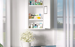 Completed wooden medicine cabinet organized with skincare and first-aid items.