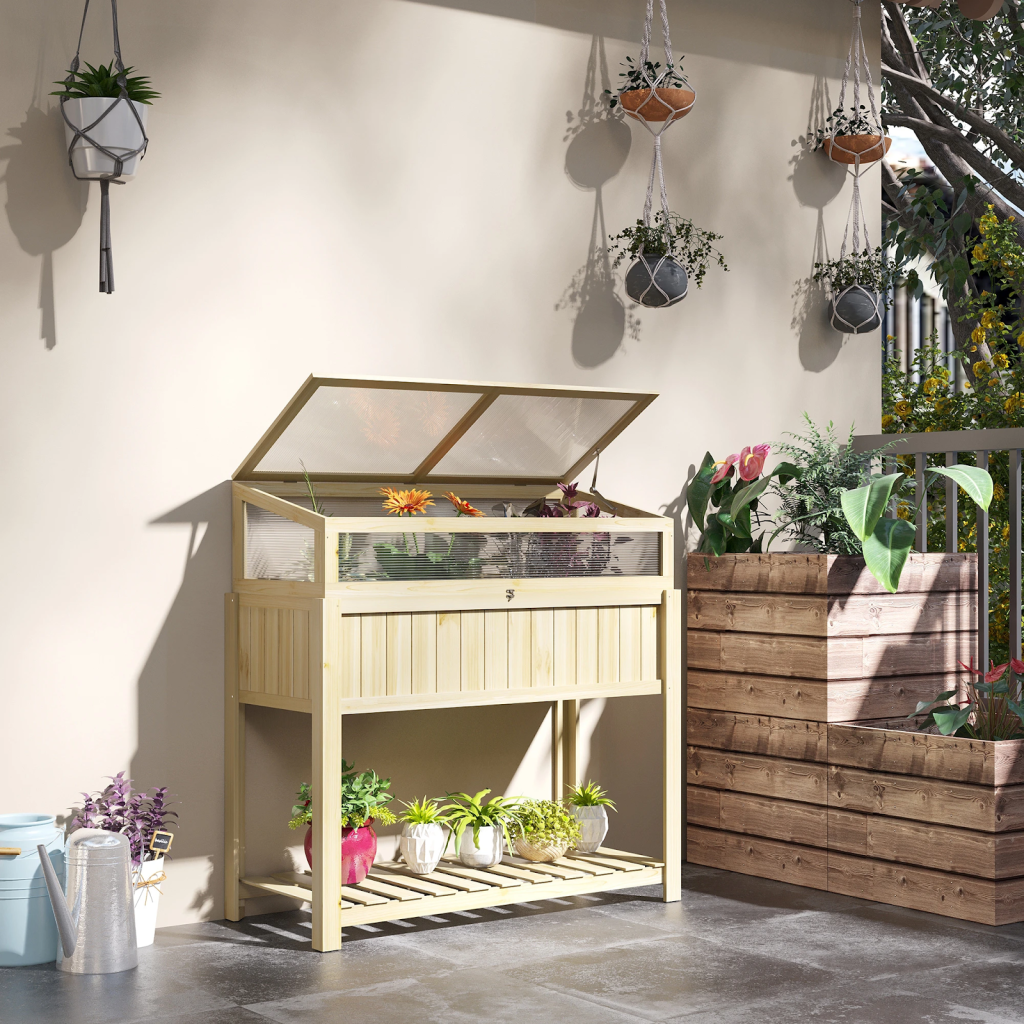 Wooden raised planter with open lid and potted plants