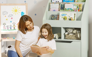 Mother reading with child in tidy pastel nursery with bookshelf