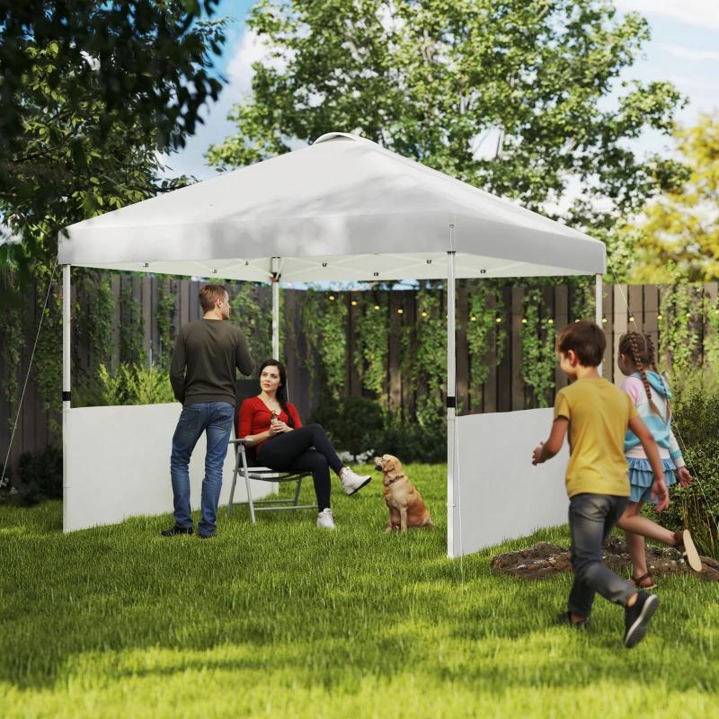 Family enjoying outdoor pop-up tent in sunny backyard garden.