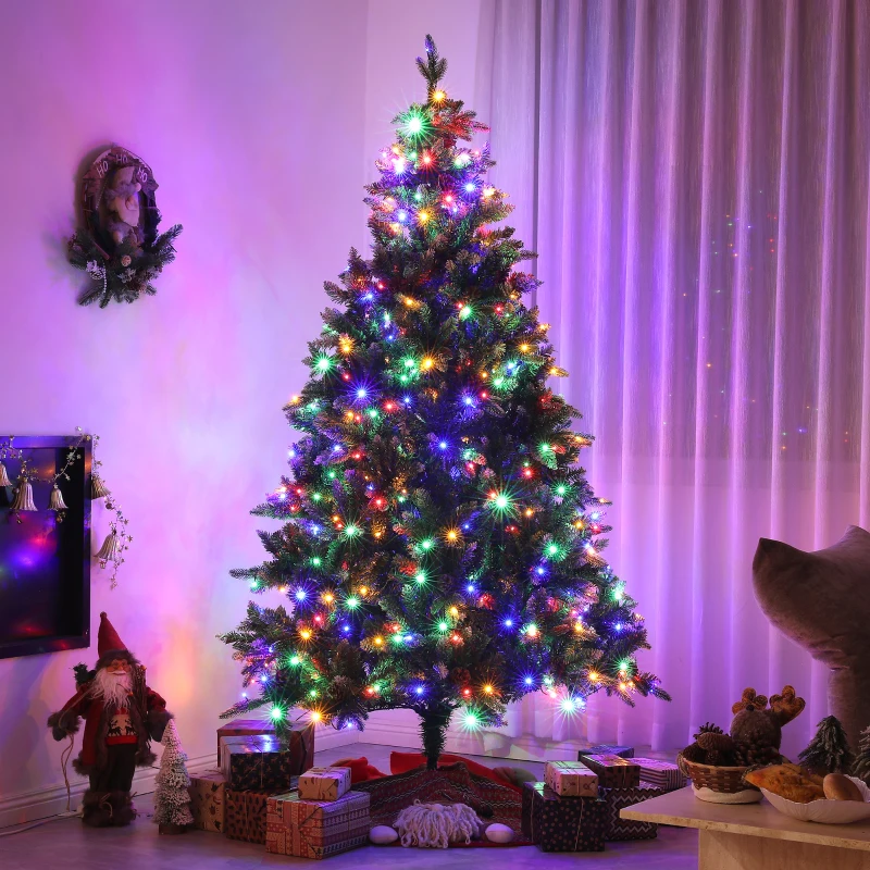 Full green Christmas tree with colorful LED lights glowing brightly.