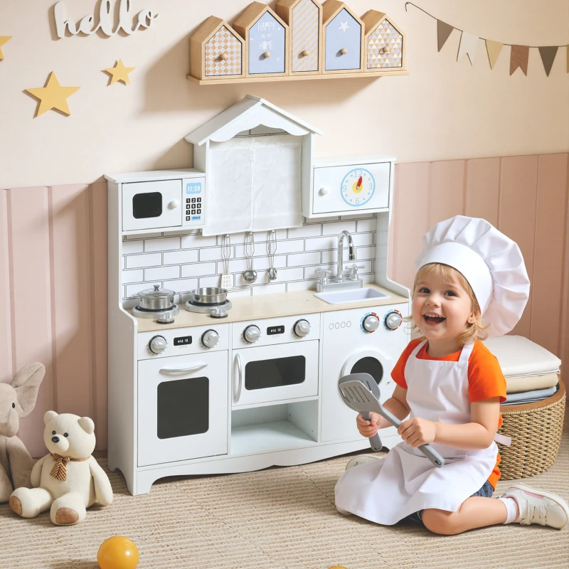 Child dressed as chef cooking on white kitchen playset with utensils.