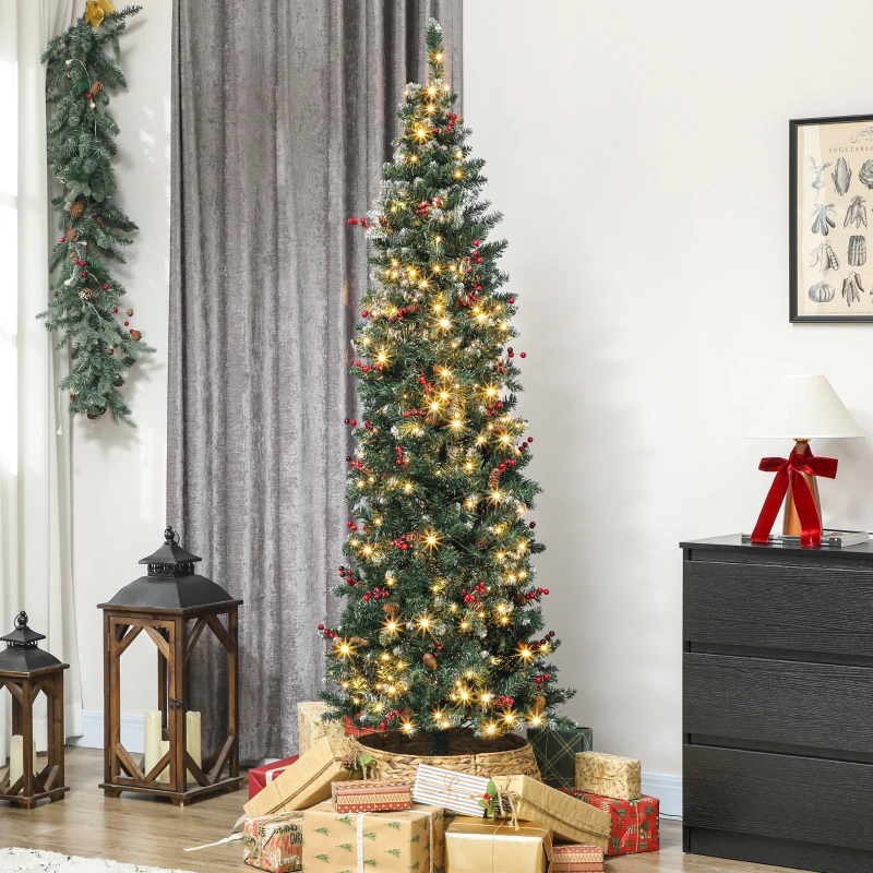 Tall slim pre-lit Christmas tree with warm LED lights and wrapped gifts in a cozy living room