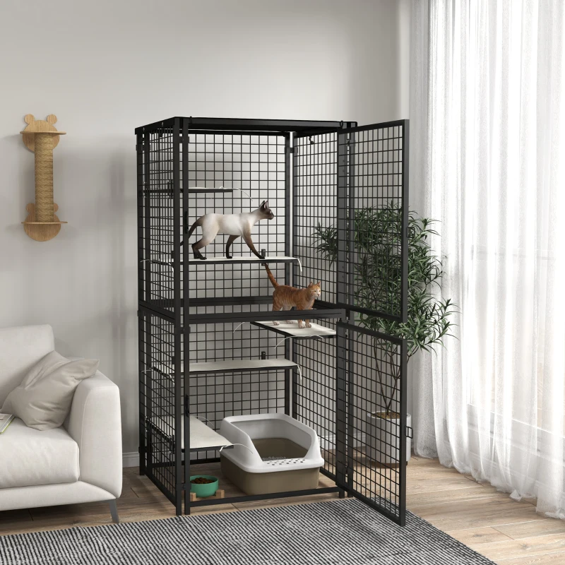 Spacious black cat cage with climbing shelves and litter box set beside a window indoors.