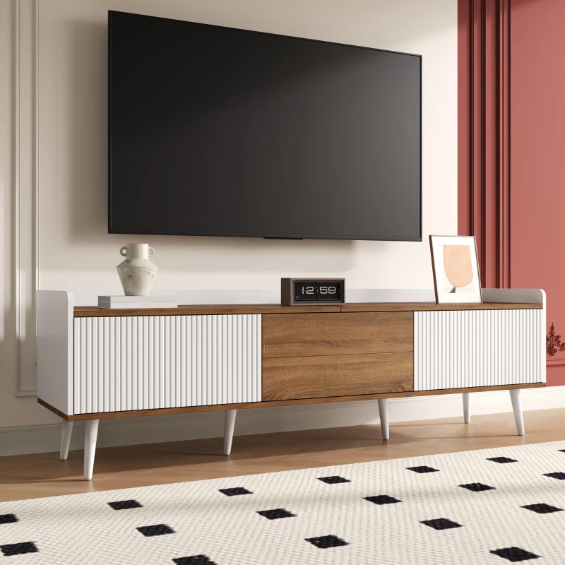Modern TV console with white and walnut finish and three storage doors.