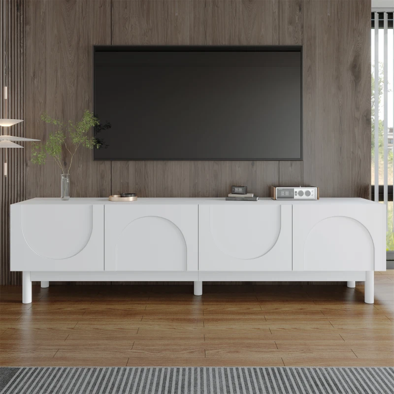White modern TV stand with curved wave-pattern doors and wooden floor background.