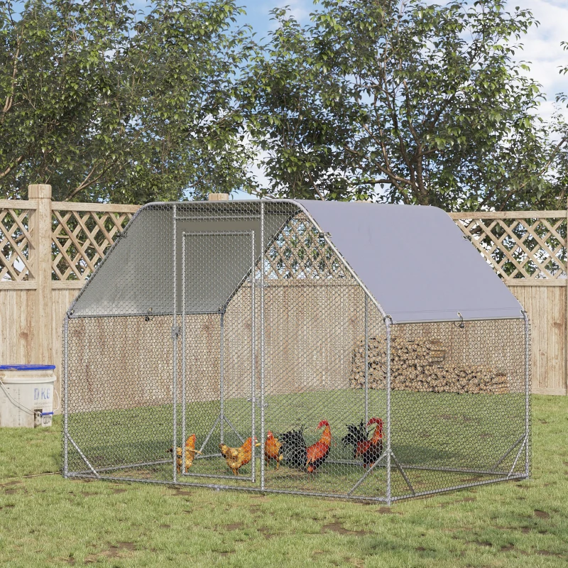 Metal framed chicken enclosure with flat roof and mesh sides in green garden setting.
