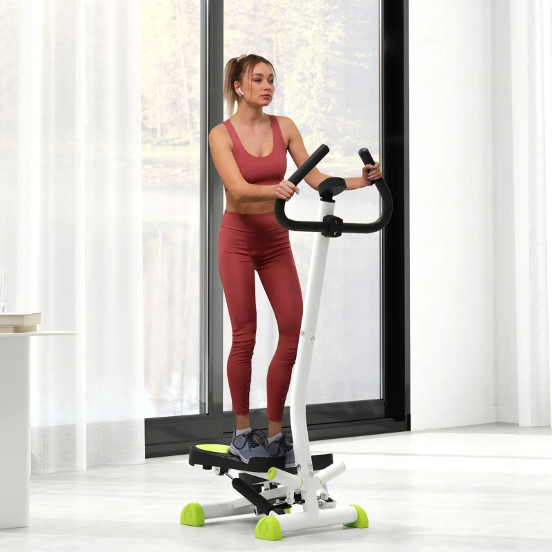 woman in red fitness outfit using white and green stepper indoors.