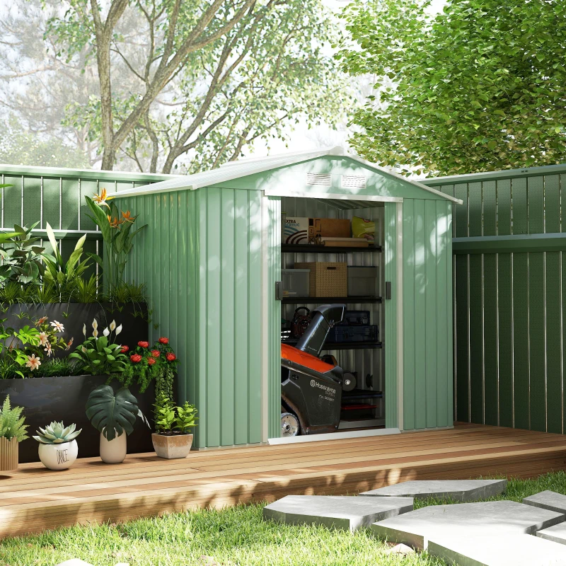 Dark grey compact metal garden shed on deck with open doors showing tools and ladder inside.