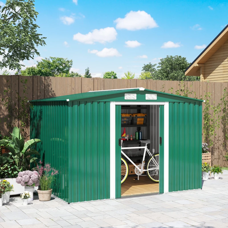 Light brown outdoor storage shed on deck with open doors and man arranging tools.