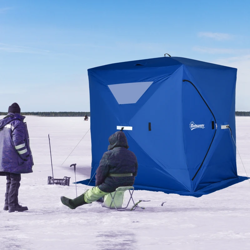 Blue pop-up ice fishing tent on frozen lake with anglers.