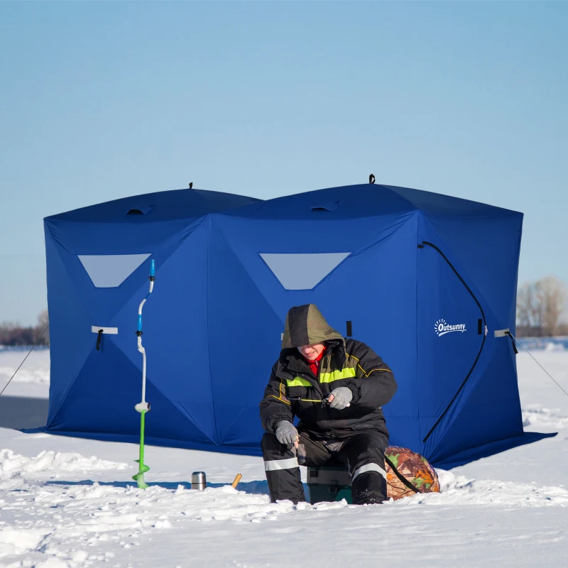 Black double pop-up ice tent on snow with fisherman outside.
