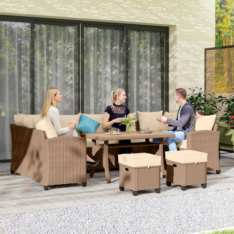 Outdoor rattan sofa set with grey cushions and coffee table on terrace.