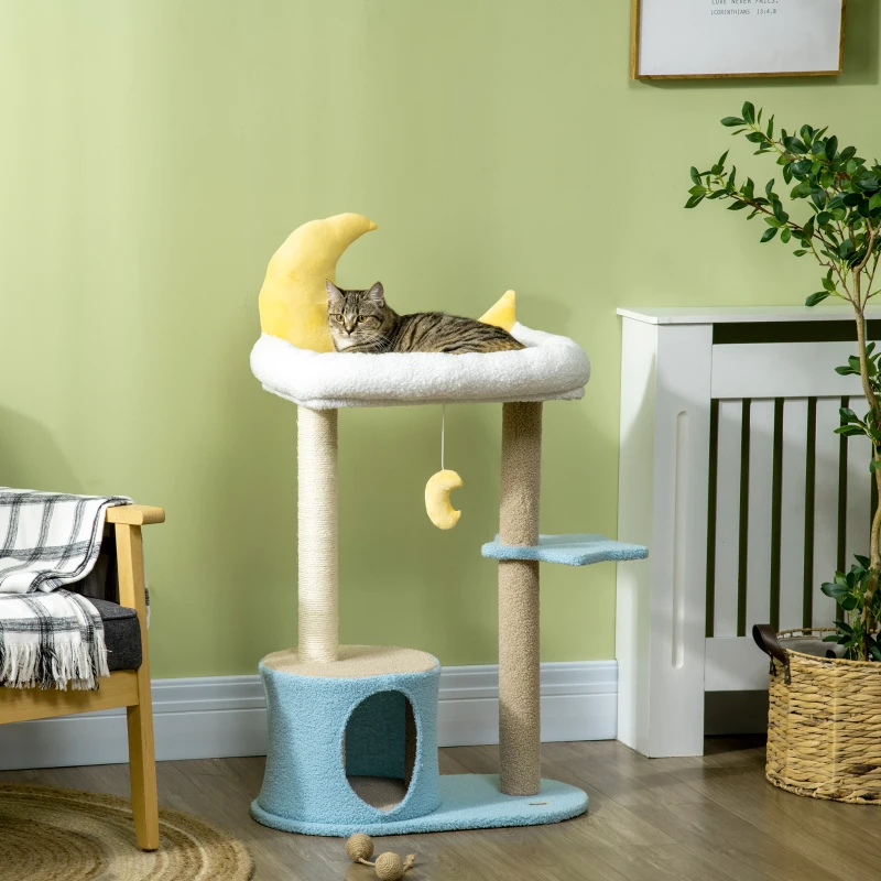 Cat lying on moon-themed tower with soft white fleece bed.