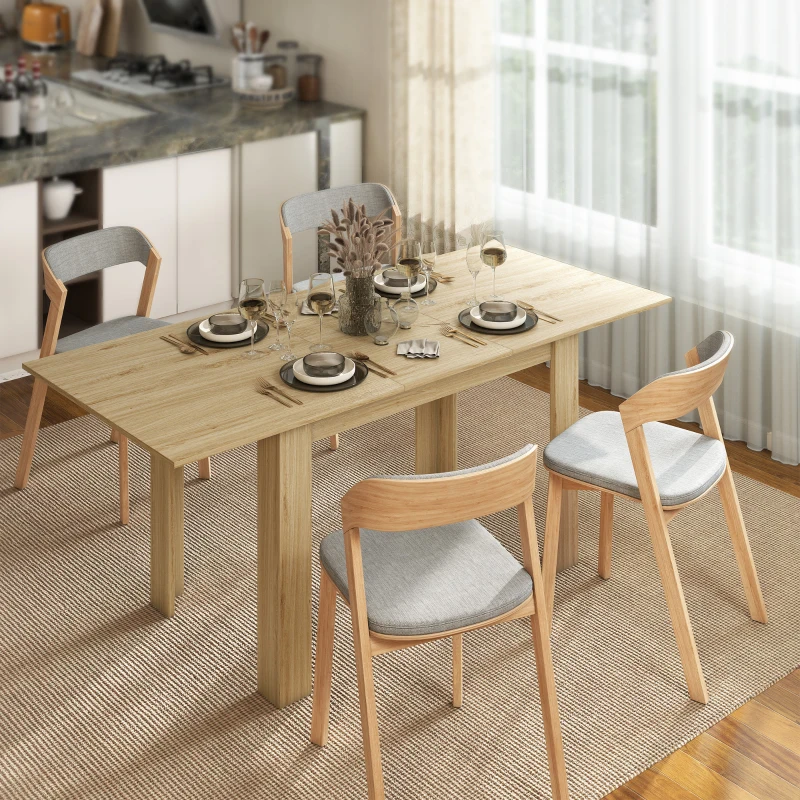Modern wooden dining table set with dishes and wine glasses