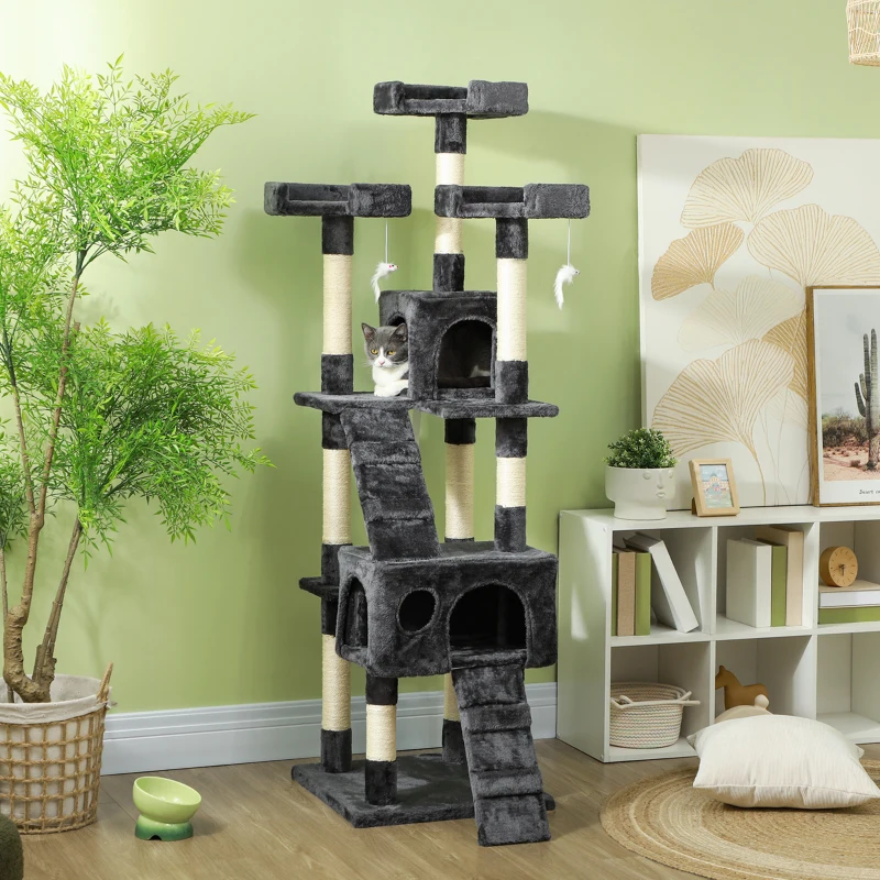 Large multi-tier grey cat tree with ramps, perches, condos, and a cat resting on a middle platform.