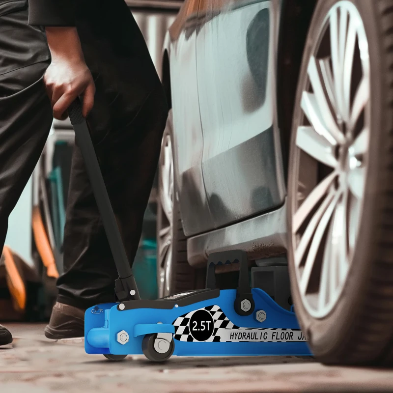 Mechanic raising vehicle using blue low-profile hydraulic racing floor jack.