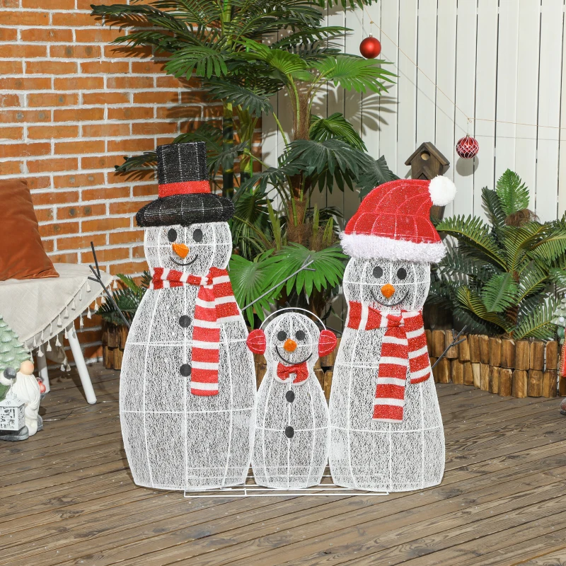 three lighted snowmen displayed on wooden patio.