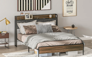 Modern bedroom with minimalist furniture and geometric framed wall art above bed.