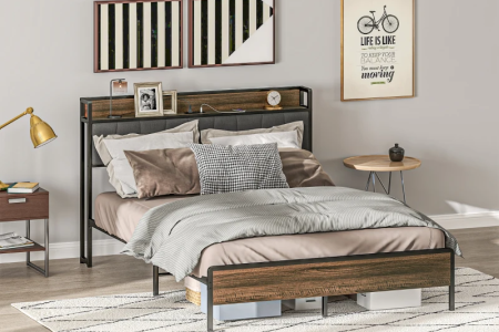 Modern bedroom with minimalist furniture and geometric framed wall art above bed.