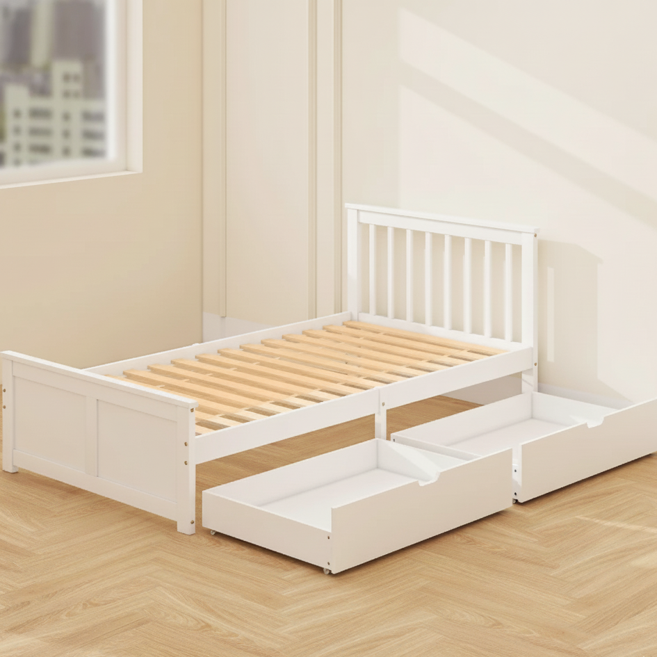 White twin bed frame with slatted base and under-bed drawers in light room.