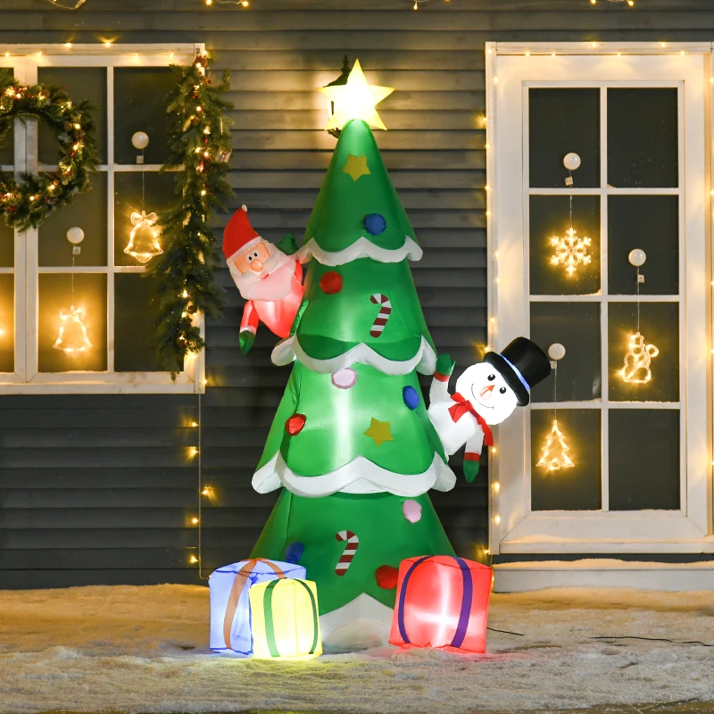 Inflatable Santa climbing Christmas tree with dog pulling pants.