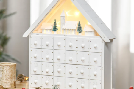 Wooden light-up house-shaped Advent calendar with 24 drawers and festive garland