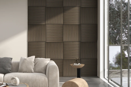 Modern living room with dark wood panelling accent wall and neutral sofa decor