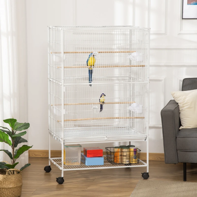 Large white rolling bird cage with two birds inside.