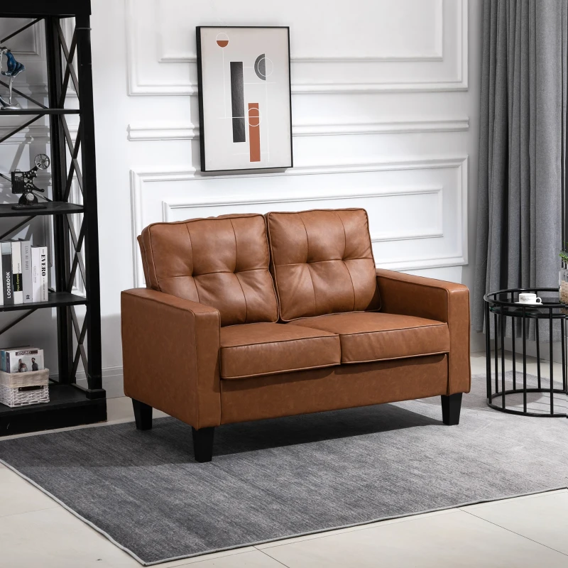 Brown faux leather loveseat with tufted cushions in a modern white-walled living room