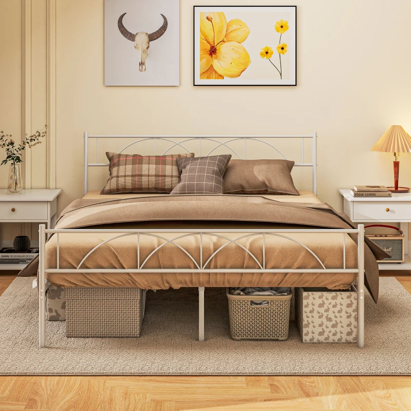 White metal queen bed frame with brown bedding and under-bed baskets in cozy room.