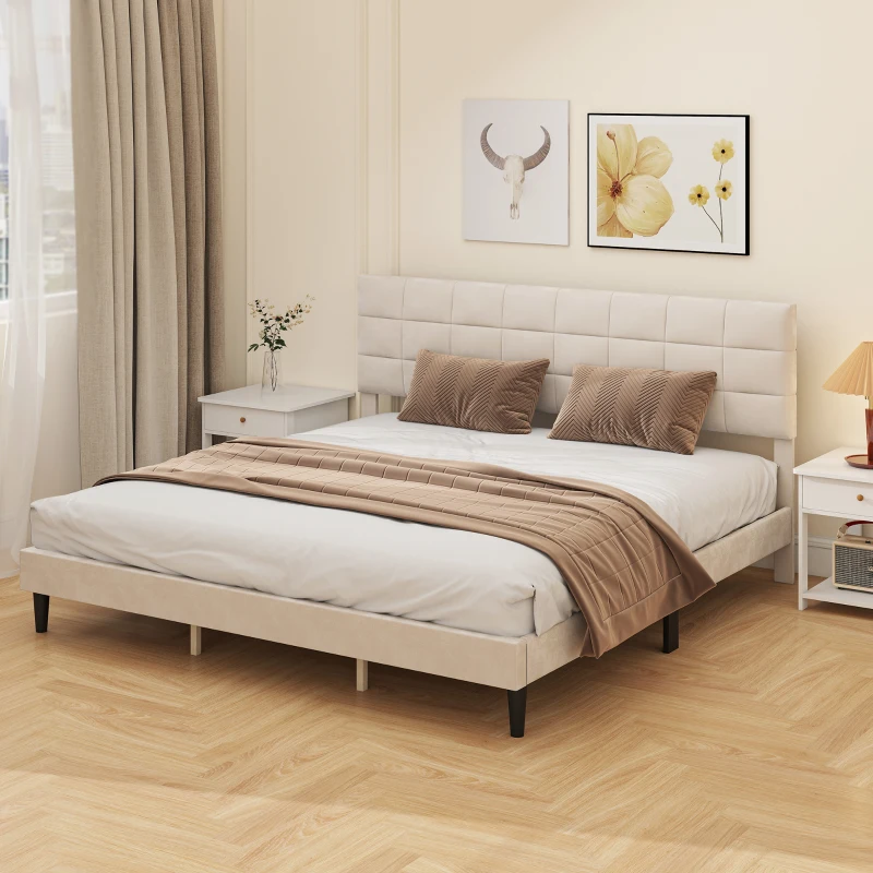 Cream upholstered king bed frame with cushioned headboard in elegant bedroom.