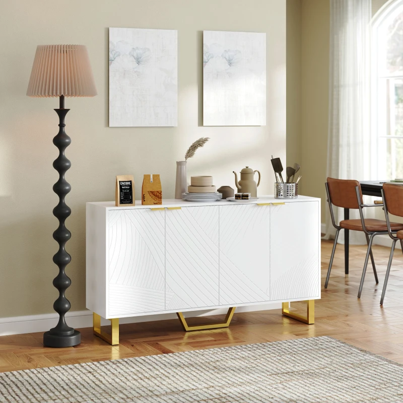 White sideboard buffet cabinet with gold legs and handles placed in a modern dining area with warm lighting and decor.