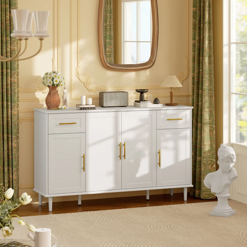 Elegant white buffet cabinet with gold handles styled in a traditional dining room setting