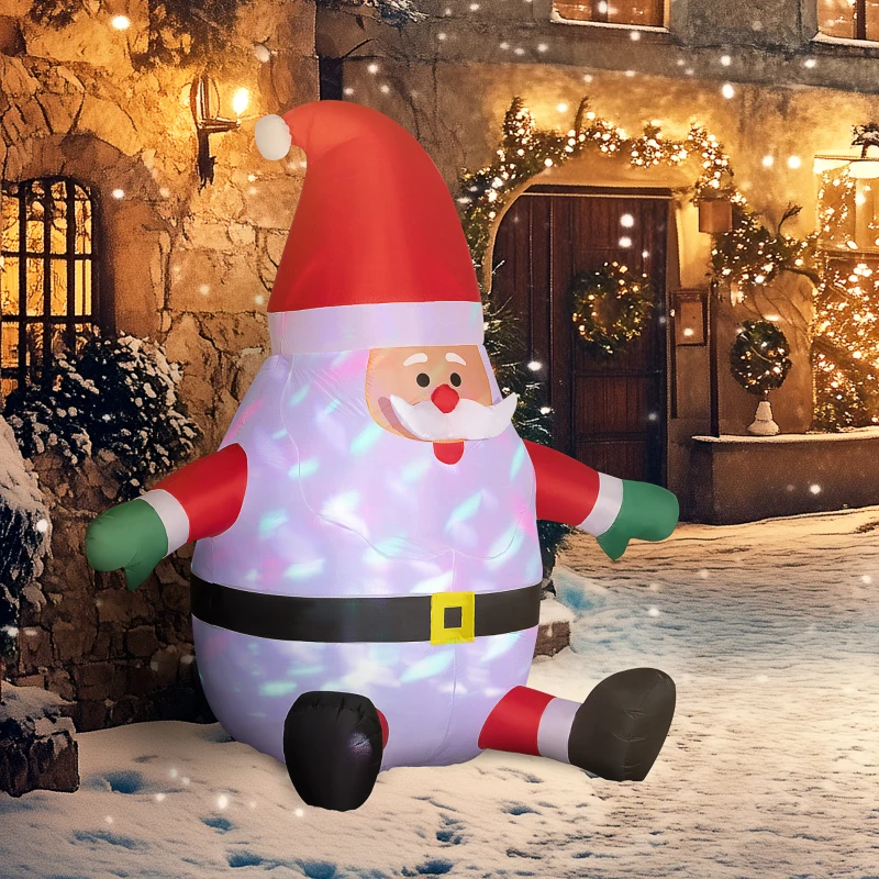 Round glowing Santa inflatable sitting on snowy yard with festive background lights.