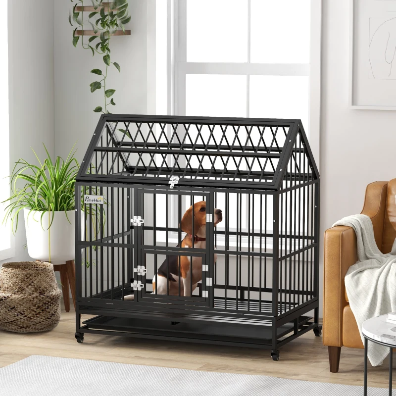 Black steel dog crate with beagle sitting indoors.
