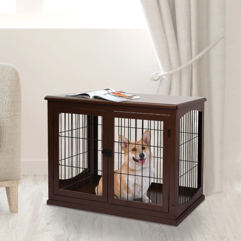 Small brown dog crate table with corgi inside, placed beside sofa.