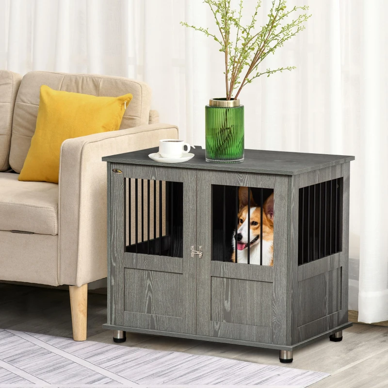 Gray wooden dog crate table with corgi beside sofa.