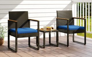Photo of completed wicker patio chairs and table on a deck.