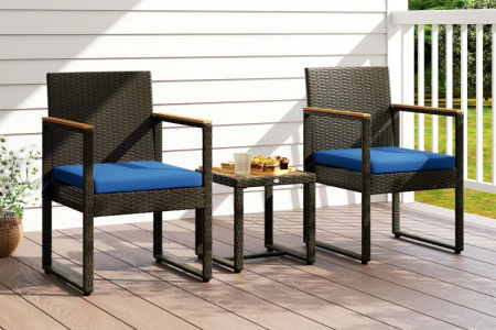 Photo of completed wicker patio chairs and table on a deck.