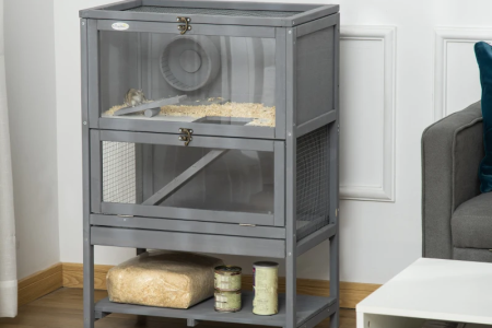 Two-story gray wooden hamster cage with glass and wire panels.