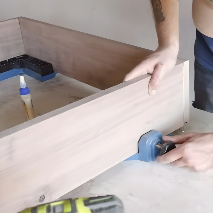 Assembling the wooden dog bed frame using a pocket hole jig and screws